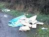 Image of fly tipped material on the A483 near Dolfor